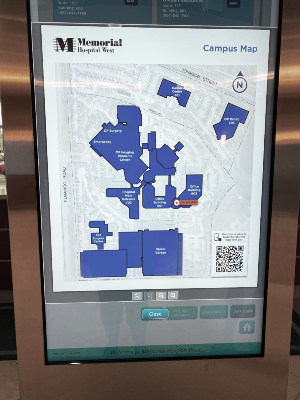 A digital campus map of Memorial Hospital West on a medical office building interactive digital kiosk in Pembroke Pines, Florida.