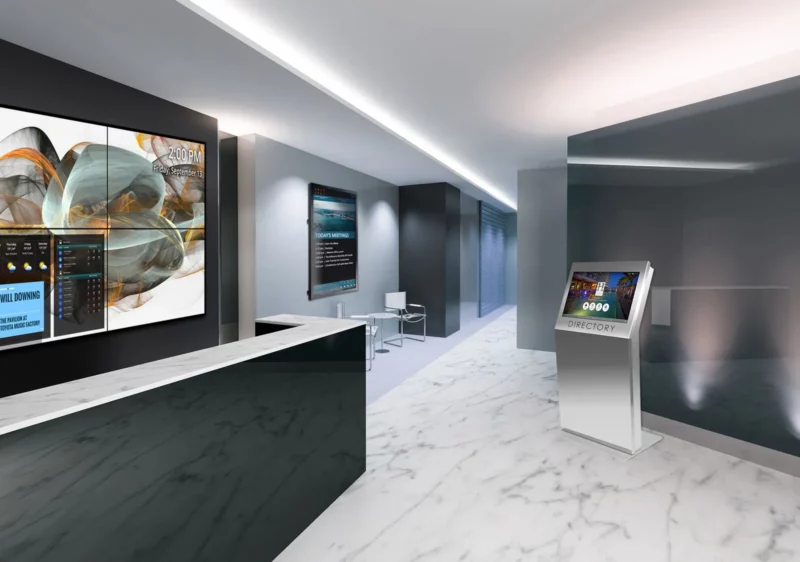 Historic lobby with freestanding interactive touch screen kiosk video wall and conference room messaging board