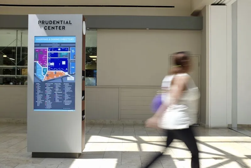 Digital wayfinding kiosk with words "Prudential Center" seen as way to revolutionize retail spaces. 