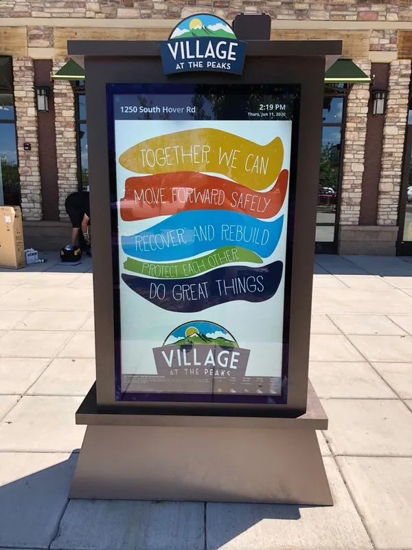 Colorful mall outdoor information kiosk seen as revolutionizing retail spaces.