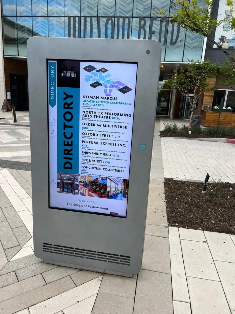 Upscale shops outdoor information kiosk seen as way to revolutionize retail spaces. 