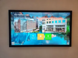 - TouchSource Digital directory board showing tenant search, amenities, and traffic information