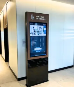 large-offices-navigation-with-lobby-displays-digital-kiosk - TouchSource - TouchSource Freestanding digital lobby kiosk in a modern office building providing tenant directories, navigation, and building information to improve the tenant and visitor experience.